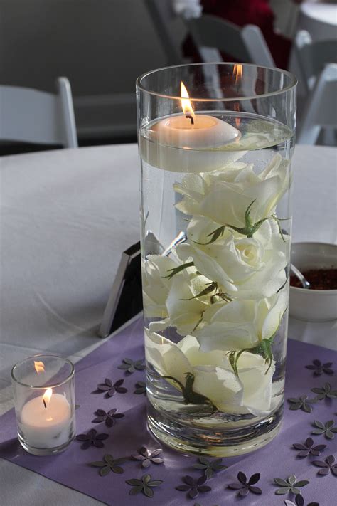 wedding floating candle centerpiece ideas|flower arrangements with candle centerpiece.